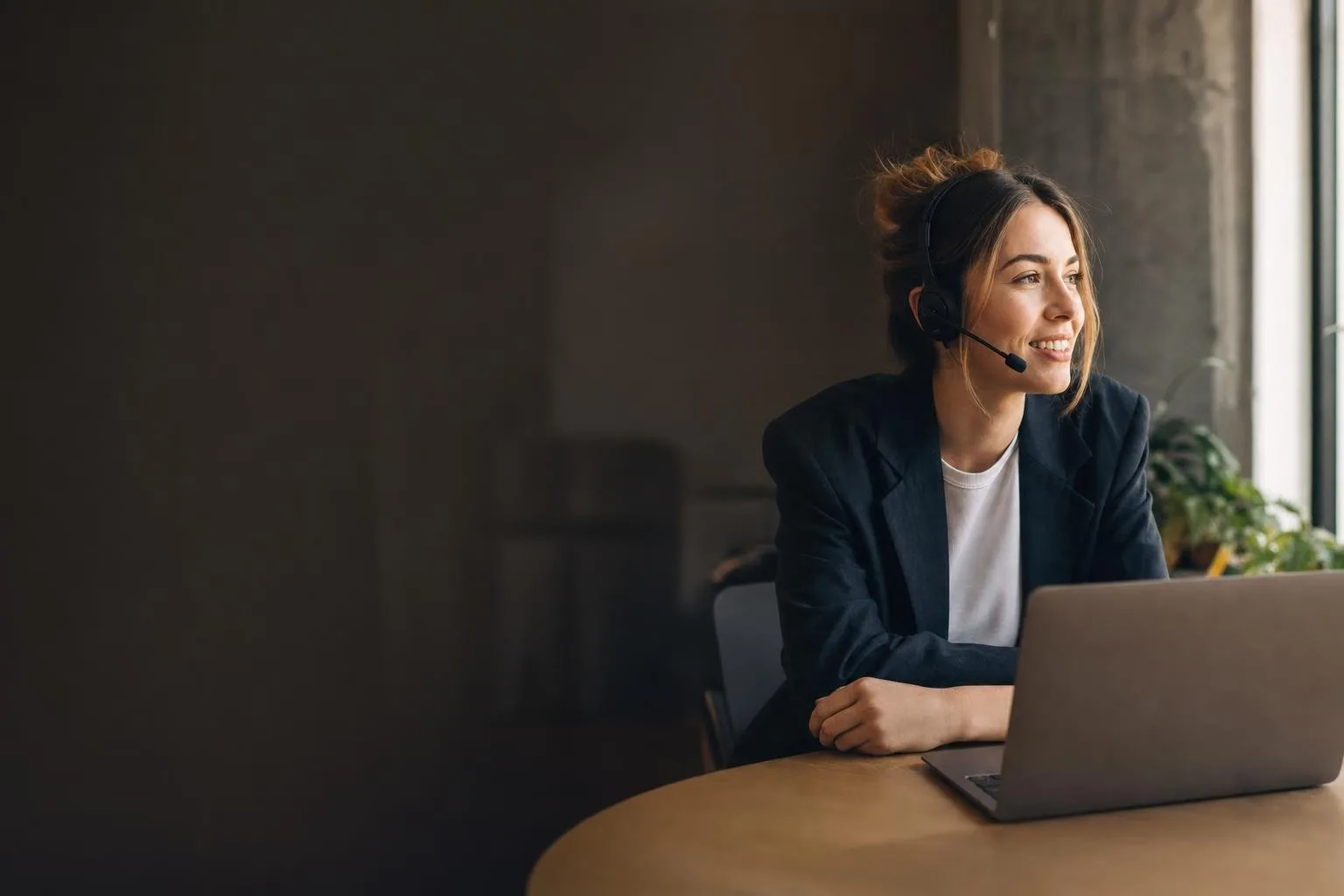Engineer watching a live technical webinar on a laptop